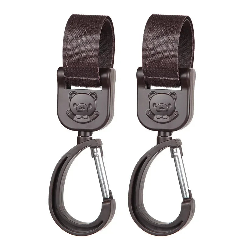 Ganchos giratorios para cochecito (2 uds.)