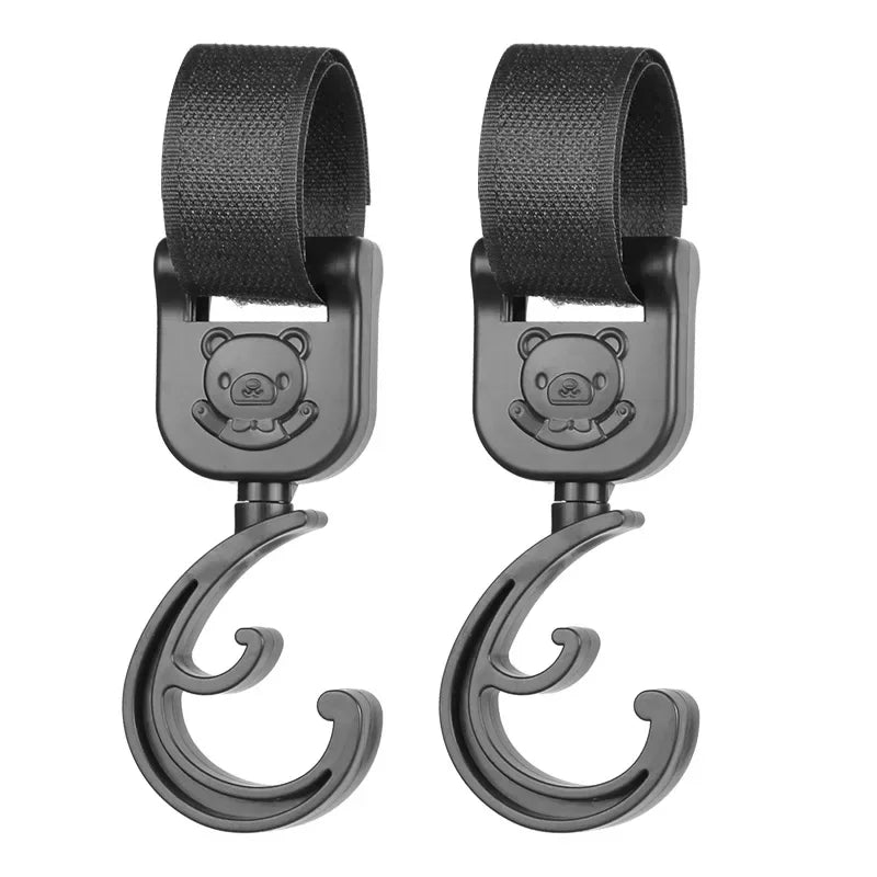 Ganchos giratorios para cochecito (2 uds.)
