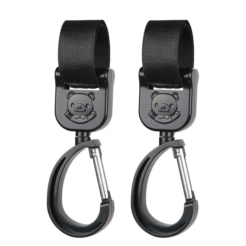 Ganchos giratorios para cochecito (2 uds.)