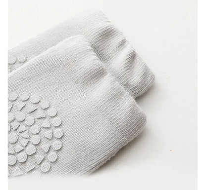 Conjunto de calcetines y rodilleras para bebé
