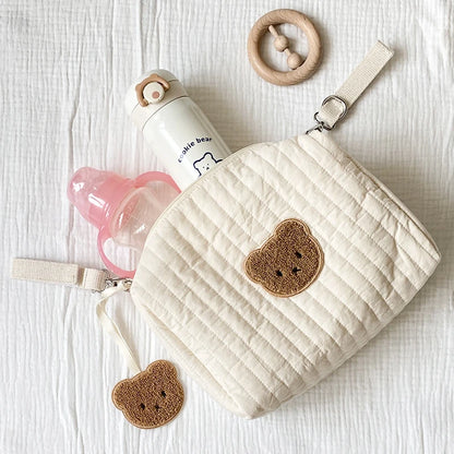 Bolsa de pañales bordada con estampado floral