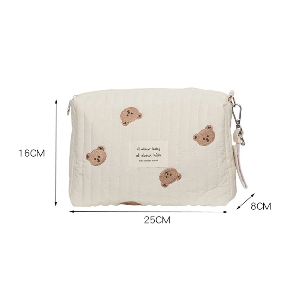 Bolsa de pañales bordada con estampado floral